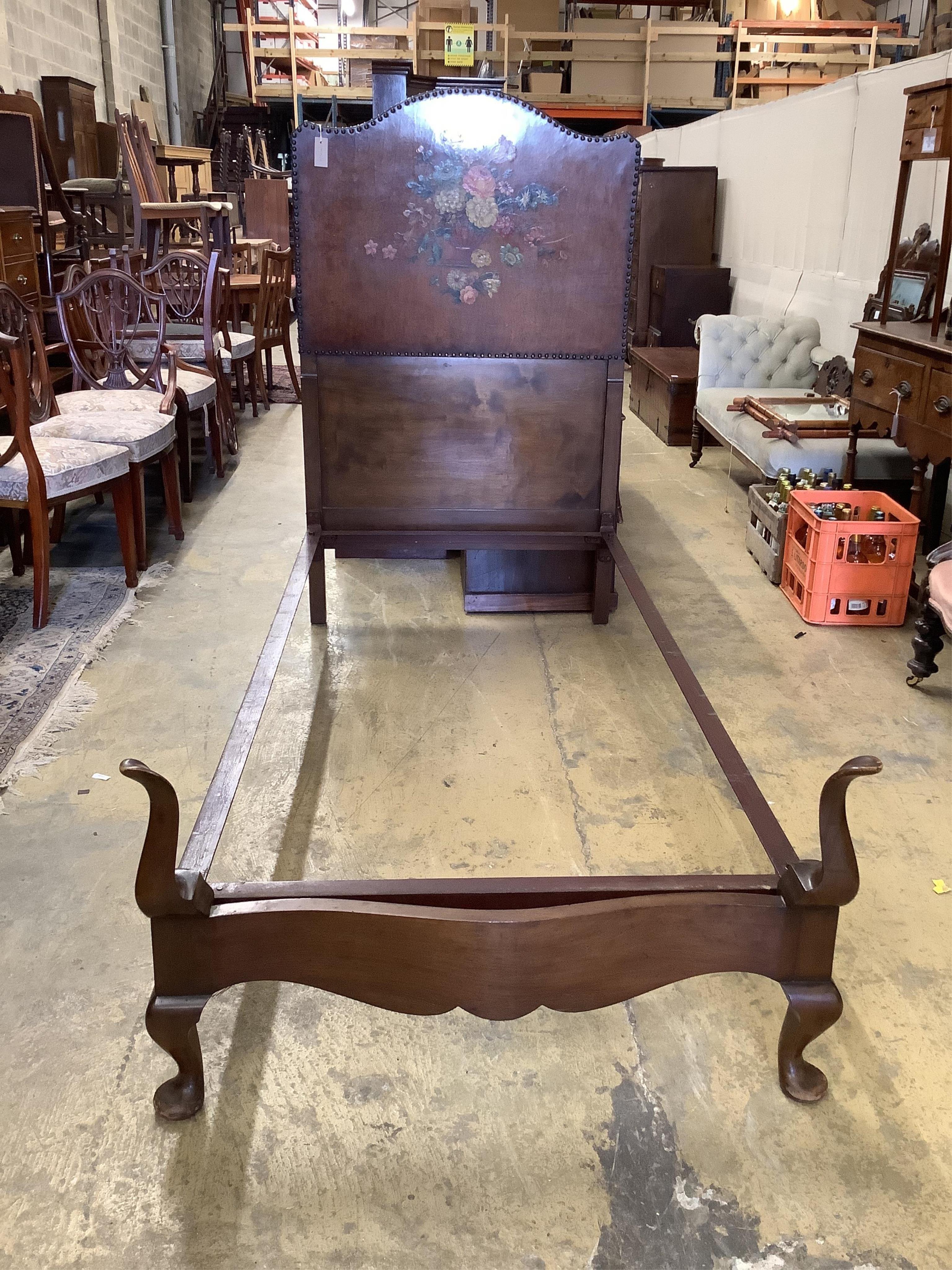 An early 20th century painted and studded leather single bedframe, length 204cm, width 92cm, height 148cm. Condition - good